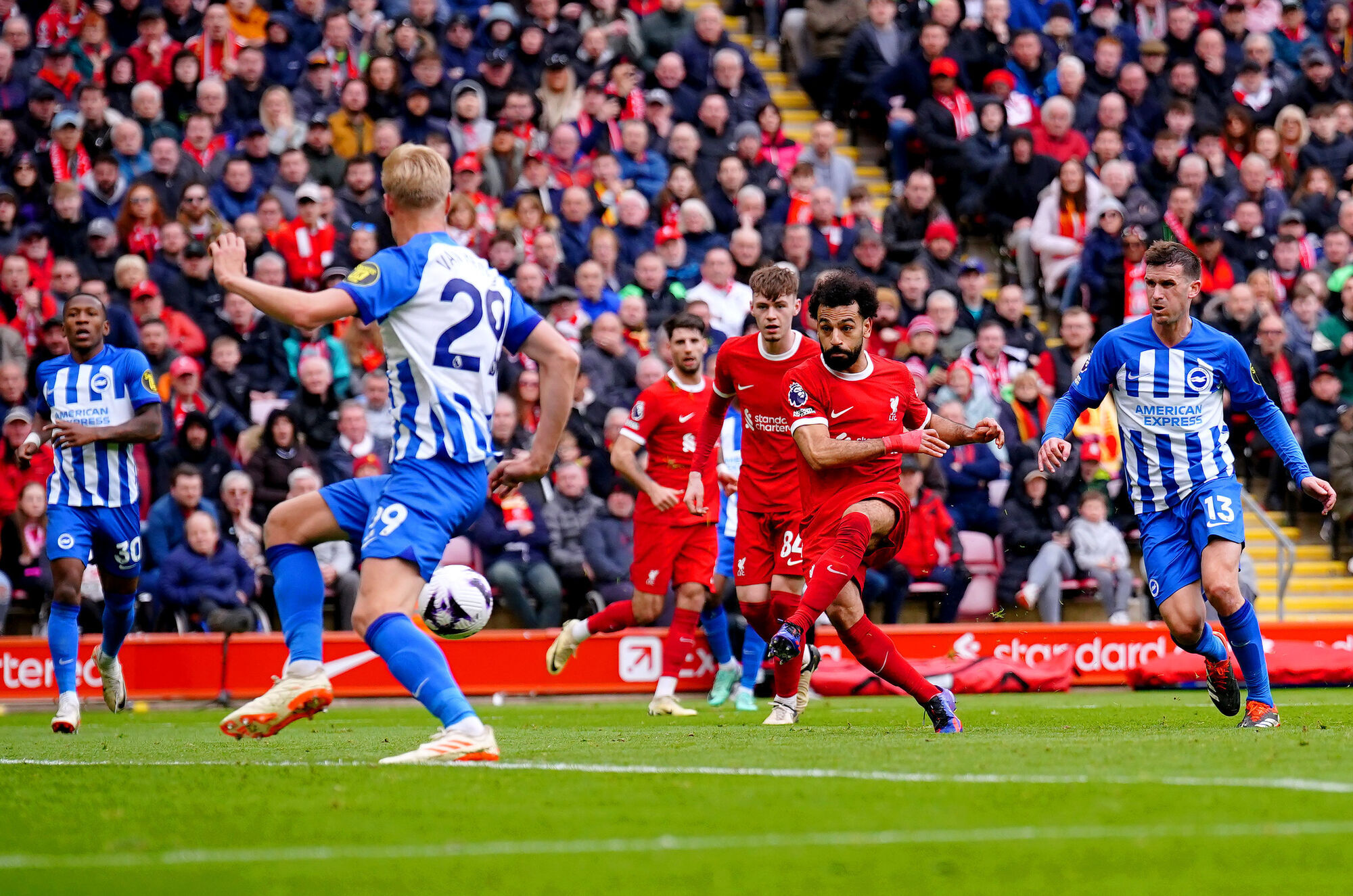 Salah secures vital Liverpool victory to keep pressure on rivals