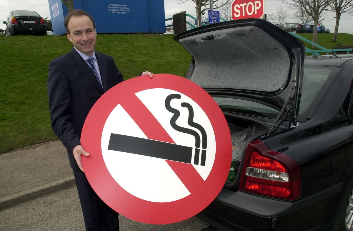 Health Minister Micheál Martin with the no smoking sign he carries around in the boot of his car. Picture: Gavin Browne
