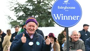 <p>BACK IN THE BIG TIME: Trainer Jimmy Mangan savours the moment after  Spillane's Tower won the Grade One WillowWarm Gold Cup at Fairyhouse.  	Picture: Healy Racing</p>