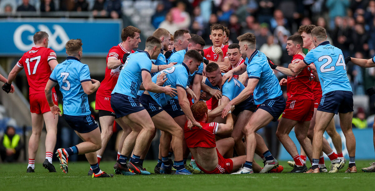 GETTING TO KNOW EACHOTHER: Derry’s Conor Glass and Paddy Small of Dublin clash. Pic: James Crombie, Inpho