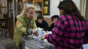 <p>A woman votes at a polling station in Istanbul (Picture: AP Photo/Emrah Gurel)</p> <p>A woman votes at a polling station in Istanbul (Picture: AP Photo/Emrah Gurel)</p>