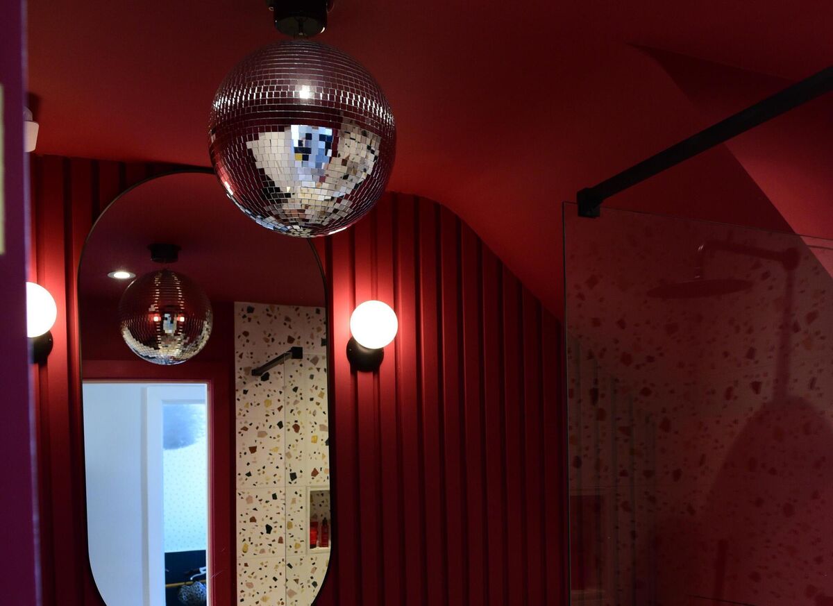 Jennifer's downstairs bathroom with disco ball. Picture: Moya Nolan