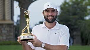<p>SCOTTIE 2 HOTTY: Scottie Scheffler holds the trophy after winning The Players Championship golf tournament. Pic credit: AP Photo/Marta Lavandier.</p>