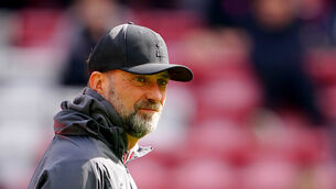 <p>GETTING ON WITH IT: Liverpool manager Jurgen Klopp does not care that his side are now considered favourites to win the Premier League.</p>