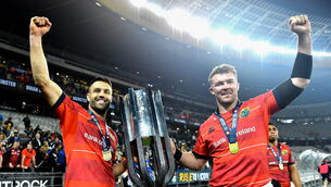 <p>FRUITS OF THEIR LABOUR: Munster players Conor Murray, left, and captain Peter O'Mahony celebrate with the trophy after the United Rugby Championship final last year. Pic: Ashley Vlotman, Sportsfile</p>