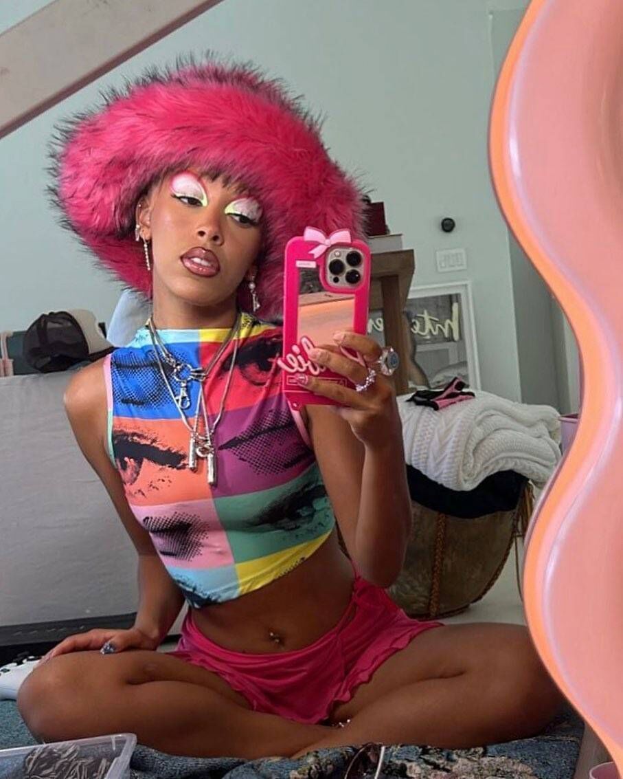 Doja Cat wearing a pink hat designed by Rashhiiid Doja Cat wearing a pink hat designed by Rashhiiid