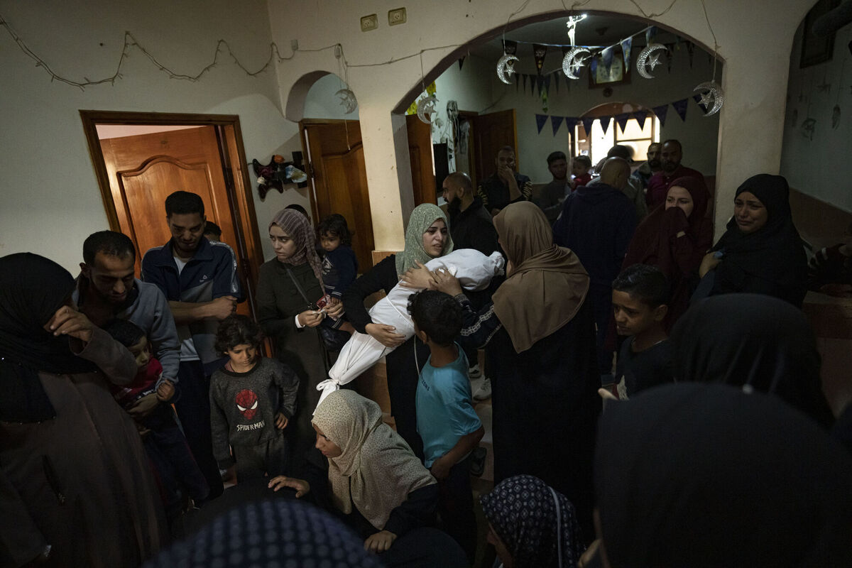 Members of the Abu Draz family gather to mourn Ashraf Abu Draz's daughters who were killed in an Israeli bomb attack in Rafah, southern Gaza, on Thursday. Picture: Fatima Shbair/AP Members of the Abu Draz family gather to mourn Ashraf Abu Draz's daughters who were killed in an Israeli bomb attack in Rafah, southern Gaza, on Thursday. Picture: Fatima Shbair/AP