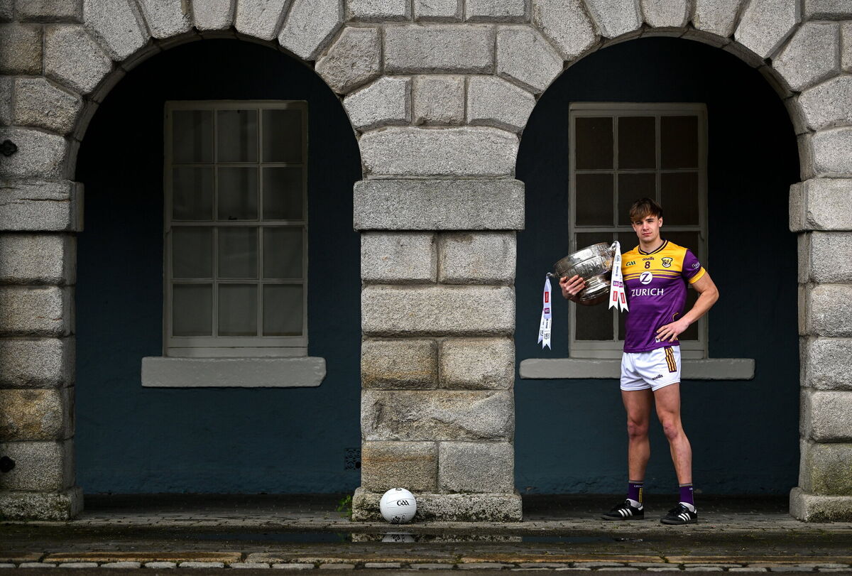 Liam Coleman of Wexford with the Delaney Cup at the launch of the 2024 Leinster SFC. Picture: Brendan Moran/Sportsfile