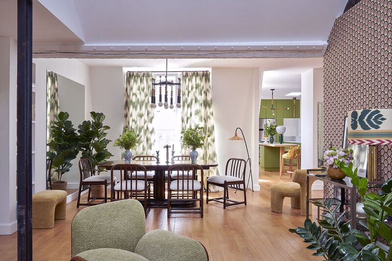 The living area expands into a dining area. The living area expands into a dining area.