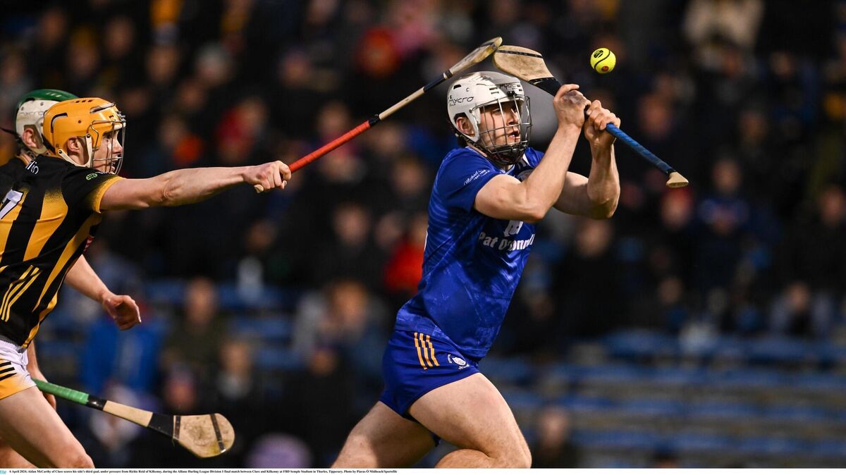 MAC ATTACK: Aidan McCarthy of Clare scores his side's third goal, under pressure from Richie Reid of Kilkenny, during the Allianz Hurling League Division 1 final match between Clare and Kilkenny at FBD Semple Stadium in Thurles, Tipperary. Pic: Piaras Ó Mídheach/Sportsfile