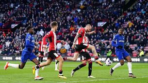<p>Oli McBurnie (centre) scores Sheffield United’s equaliser (Mike Egerton/PA)</p>