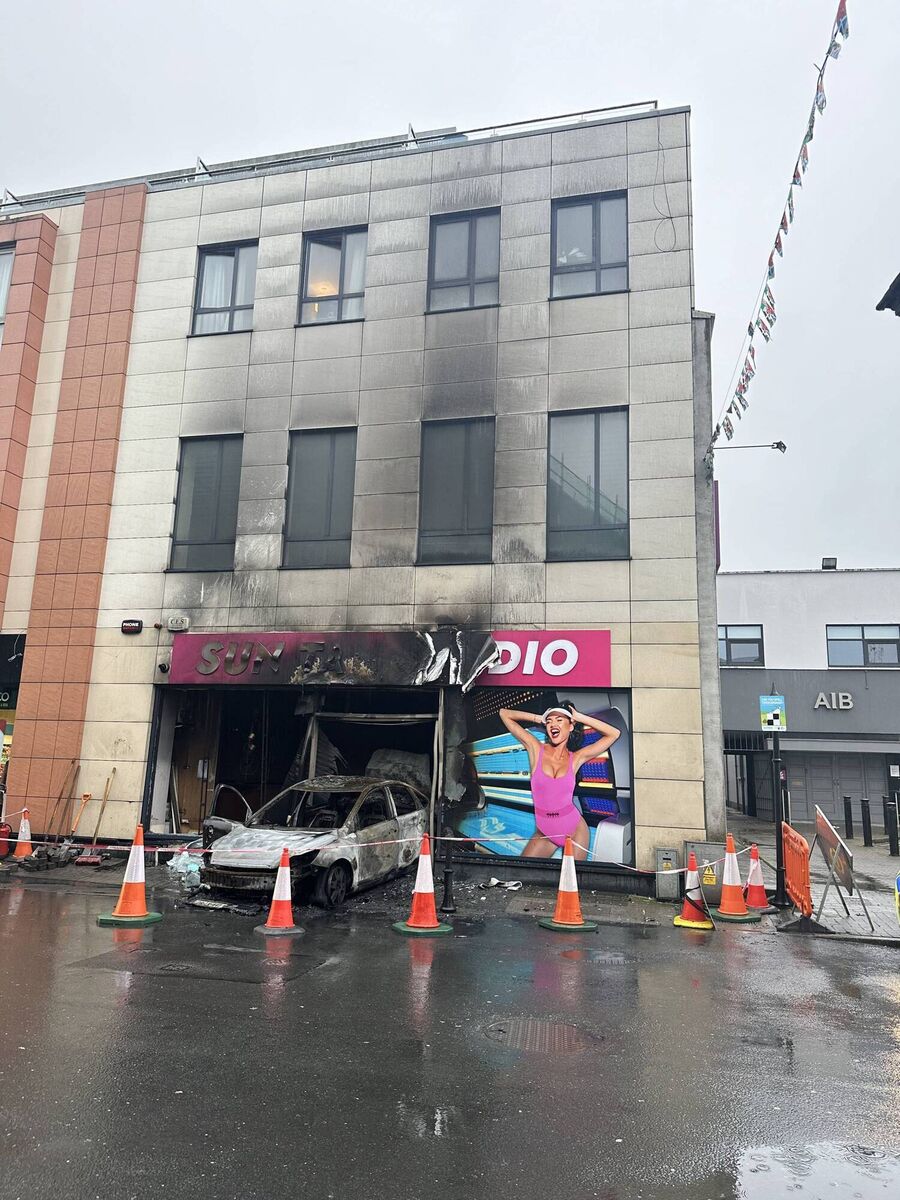 A serious fire overnight on Tullow Street in Carlow after a car went on fire after entering shop. Picture: Carlow Weather via Twitter A serious fire overnight on Tullow Street in Carlow after a car went on fire after entering shop. Picture: Carlow Weather via Twitter