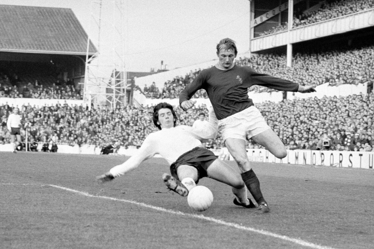 Tottenham Hotspur's Joe Kinnear and Burnley's Steve Kindon battle for the ball. Photo credit should read PA/PA Wire.