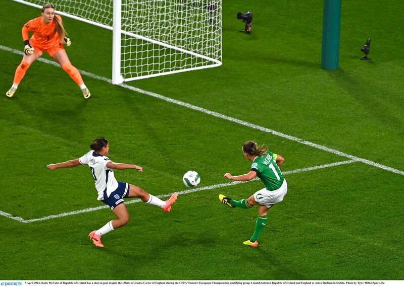 Katie McCabe of Republic of Ireland has a shot on goal despite the efforts of Jessica Carter of England during the UEFA Women's European Championship qualifying group A match between Republic of Ireland and England at Aviva Stadium in Dublin. Photo by Tyler Miller/Sportsfile Katie McCabe of Republic of Ireland has a shot on goal despite the efforts of Jessica Carter of England during the UEFA Women's European Championship qualifying group A match between Republic of Ireland and England at Aviva Stadium in Dublin. Photo by Tyler Miller/Sportsfile