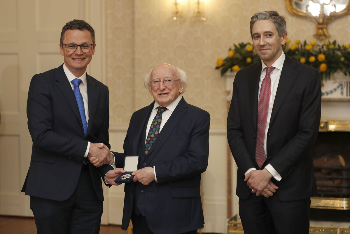 President Michael D Higgins and newly elected Taoiseach Simon Harris with the new Minister for Further Education, Patrick O'Donovan, at Áras an Uachtaráin this evening. Picture: Damien Storan/PA Wire
