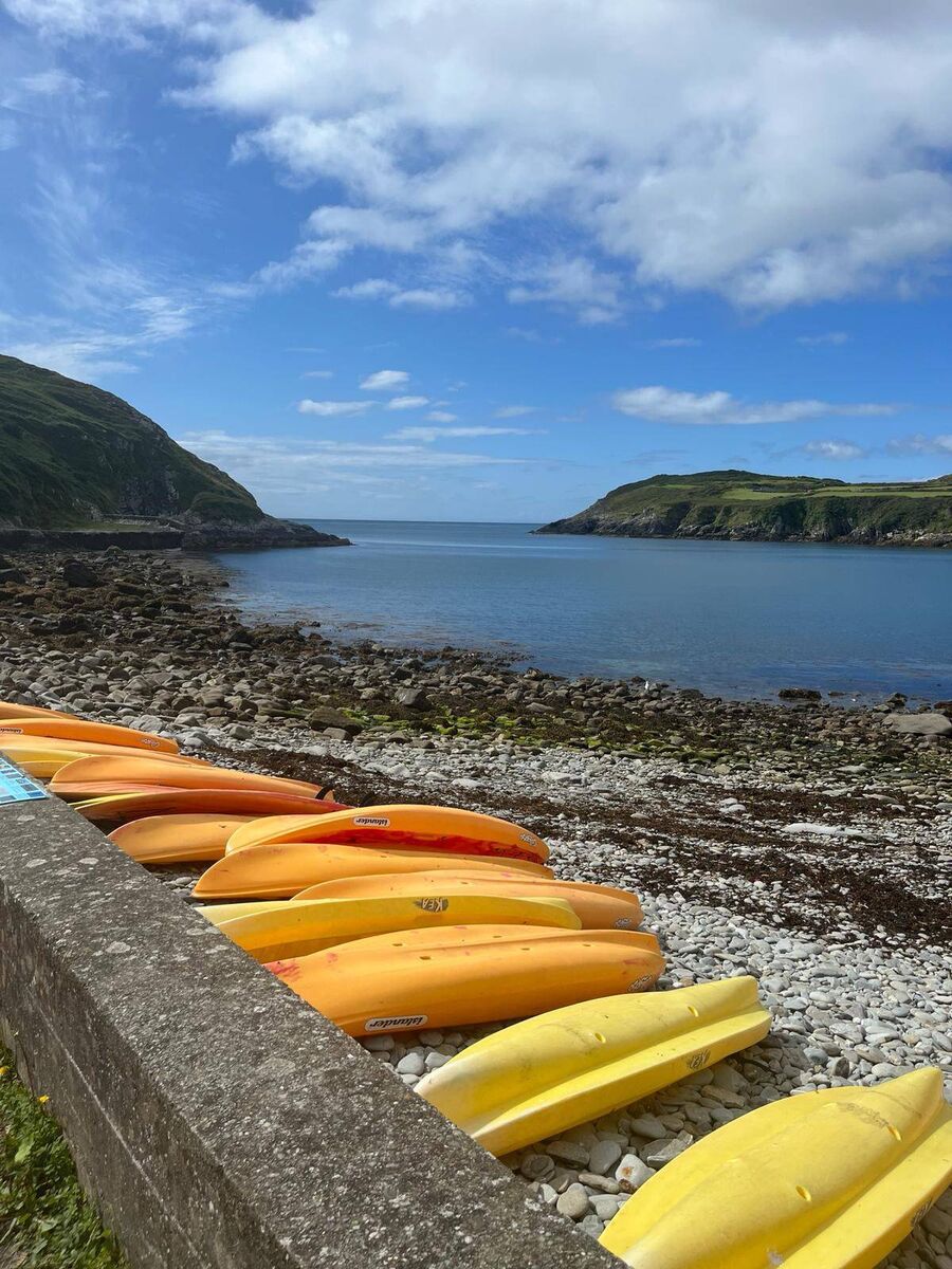 Kayaks on the beach on Cape Clear Island. 