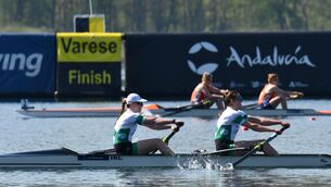 <p>Aifric Keogh, Fiona Murtagh in action at the World Cup in Lago di Varese. Picture: Rowing Ireland. </p>