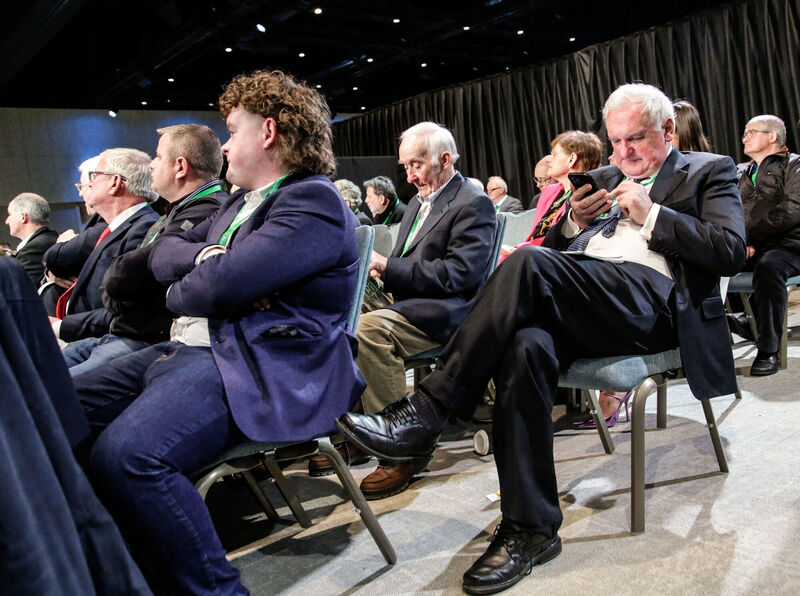 Fianna Fail members including former taoiseach Bertie Ahern watching proceedings of the party's 82nd ard fheis at the Dublin Royal Convention Centre on Saturday. Picture: Damien Storan/PA