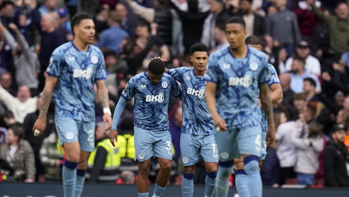 Aston Villa's Ollie Watkins and Leon Bailey celebrate.