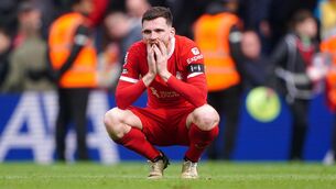 <p>Andy Robertson insists Liverpool will pick themselves up and fight on in the title race (Peter Byrne/PA)</p>