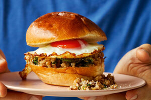 Sausage laab and fried egg bun