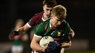 <p>SLIGO STUNNER: Mayo’s John MacMonagle in action against Galway's Padraic Godwin in the U-20 championship at McHale Park, Castlebar will be facing Sligo. Photo: Ray Ryan</p>