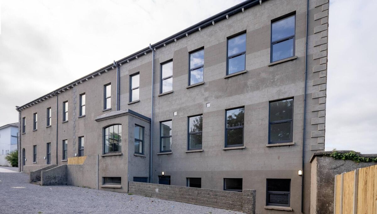 The social housing project in Charleville, developed by national homeless and housing charity Peter McVerry Trust with the support of Cork County Council under the Department for Housing’s Capital Assistance Scheme (CAS), the project has re-used a former Christian Brothers School on Main Street, Charleville, Cork, to deliver nine new social housing apartments.