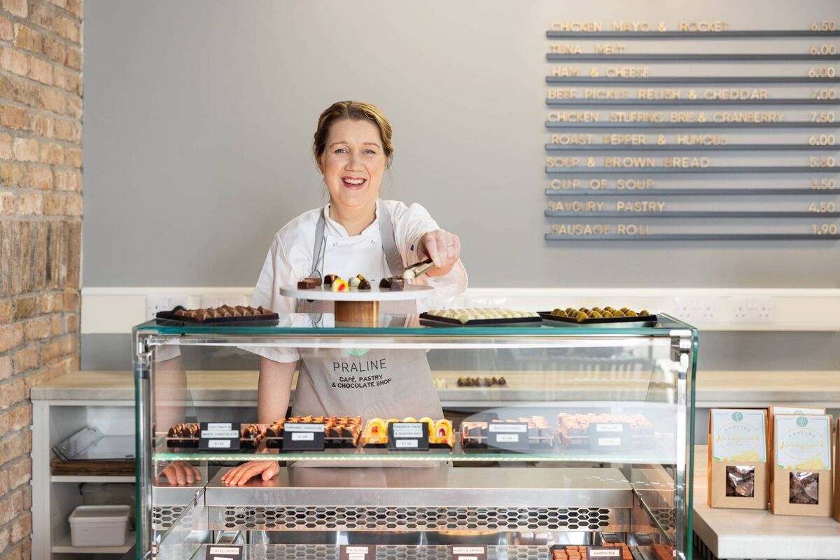Norma Kelly of Praline, with some of her outlet's pastries, cake slices and bars, all handcrafted using fresh, locally sourced ingredients.