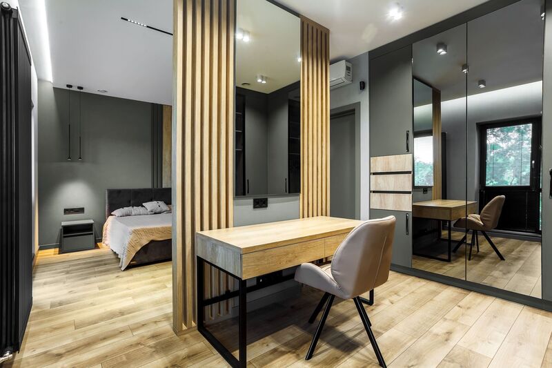Wooden slats form a bedroom feature set against Gris Verte walls by Colourtrend. Wooden slats form a bedroom feature set against Gris Verte walls by Colourtrend.