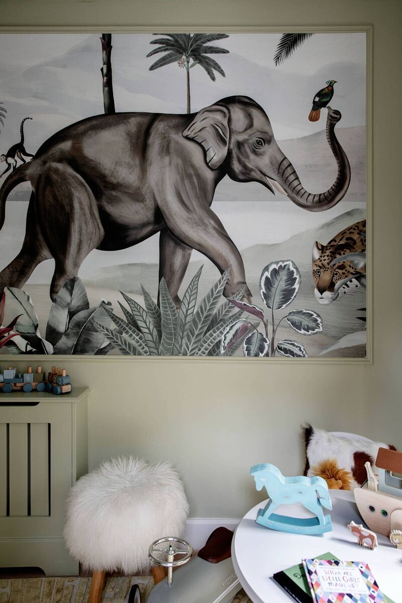 The artwork in the children's playroom is a scene from a wallpaper mural called 'Wild India Caravan'. The graphics team at Les Dominotiers in France included the animals the children loved. 