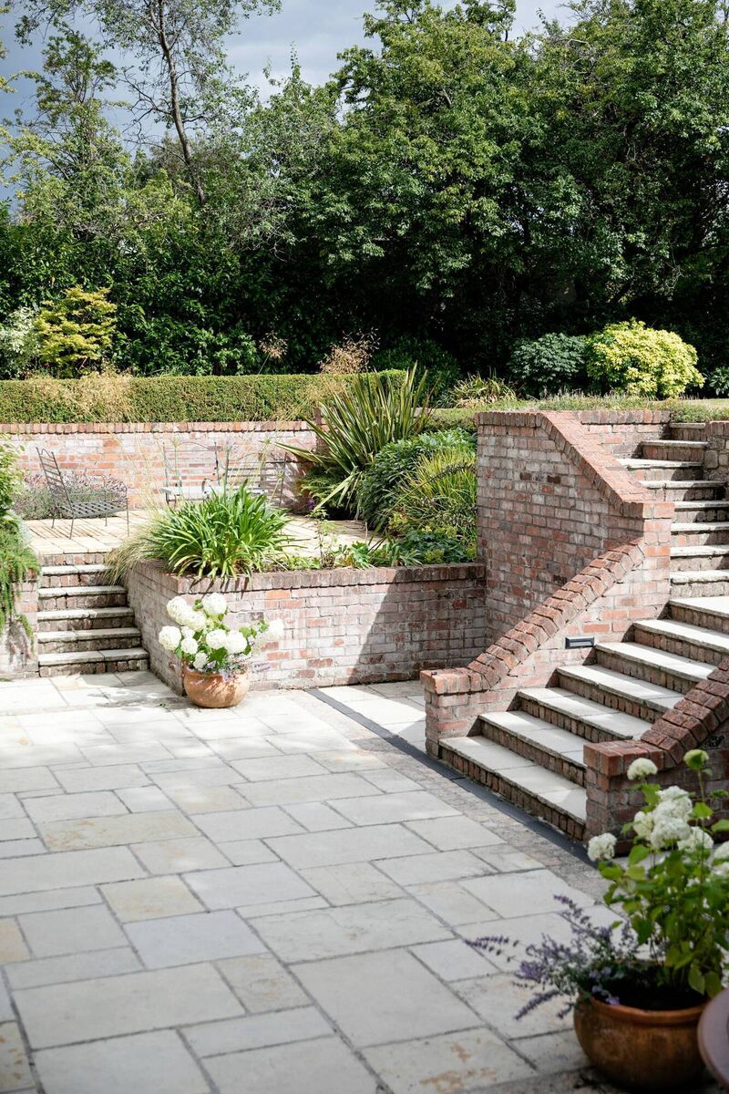 The interiors reflect the dual aspect of the gardens. 