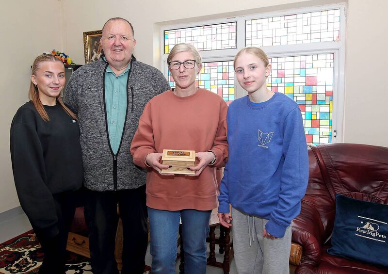Eamonn Coady (second from left) with Tracy Cullen (second from right) from Laois who collected the ashes of her pet dog Rascal with her daughters Alicia and Nikitta Cullen at the Resting Pets Crematorium. Pet owners who avail of cremations receive a wooden casket featuring the dates of the animal’s birth and death. Dog owners are gifted their pet’s pawprint immortalised in clay. Picture: Noel Browne