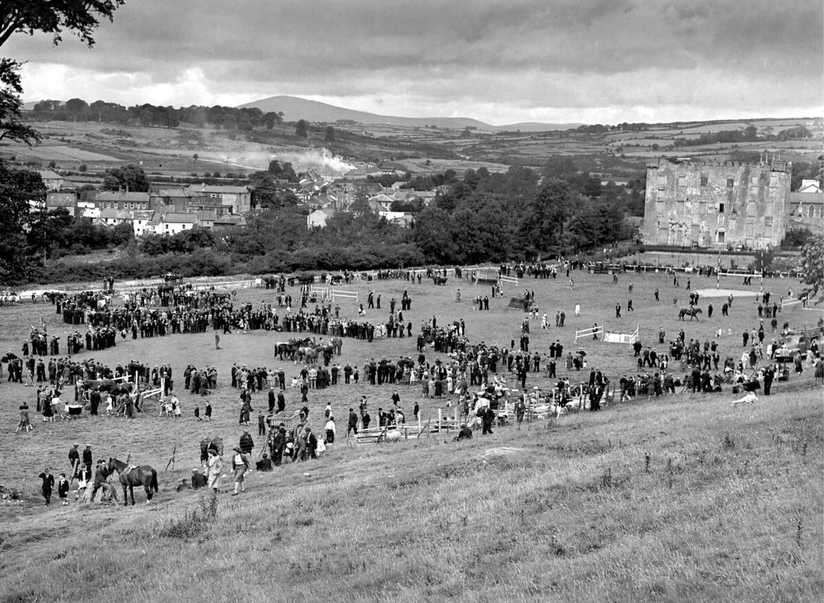 Crowds visiting the 1948 Macroom Agricultural Show on the grounds of Macroom Castle, Co Cork. Picture: Irish Examiner Archives
                    