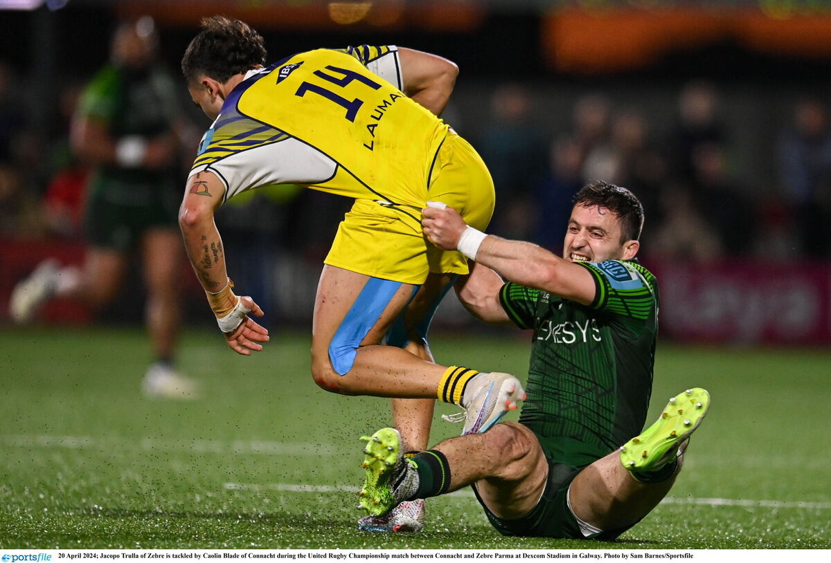 Jacopo Trulla of Zebre is tackled by Caolin Blade of Connacht during the United Rugby Championship match between Connacht and Zebre Parma at Dexcom Stadium in Galway. Photo by Sam Barnes/Sportsfile