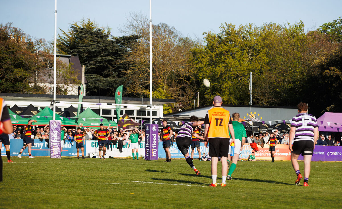 Terenure's Aran Egan converts a penalty kick to win the game for Terenure. Pic Credit: Tom Maher, Inpho.