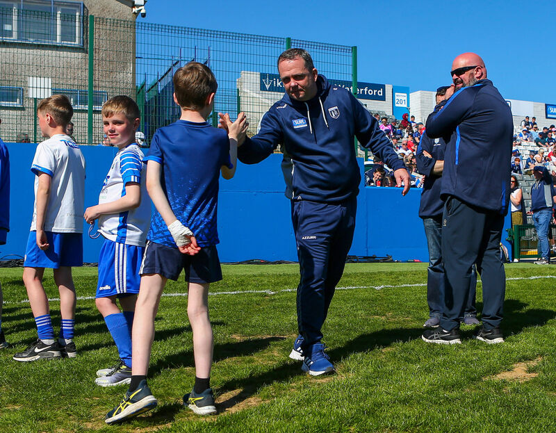 Waterford manager Davy Fitzgerald greets mascots from Waterford’s primary games before the game