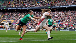 <p>England's Abby Dow (right) passes Ireland's Katie Corrigan as she runs in to score a try. Photo credit: Gareth Fuller/PA Wire.</p>