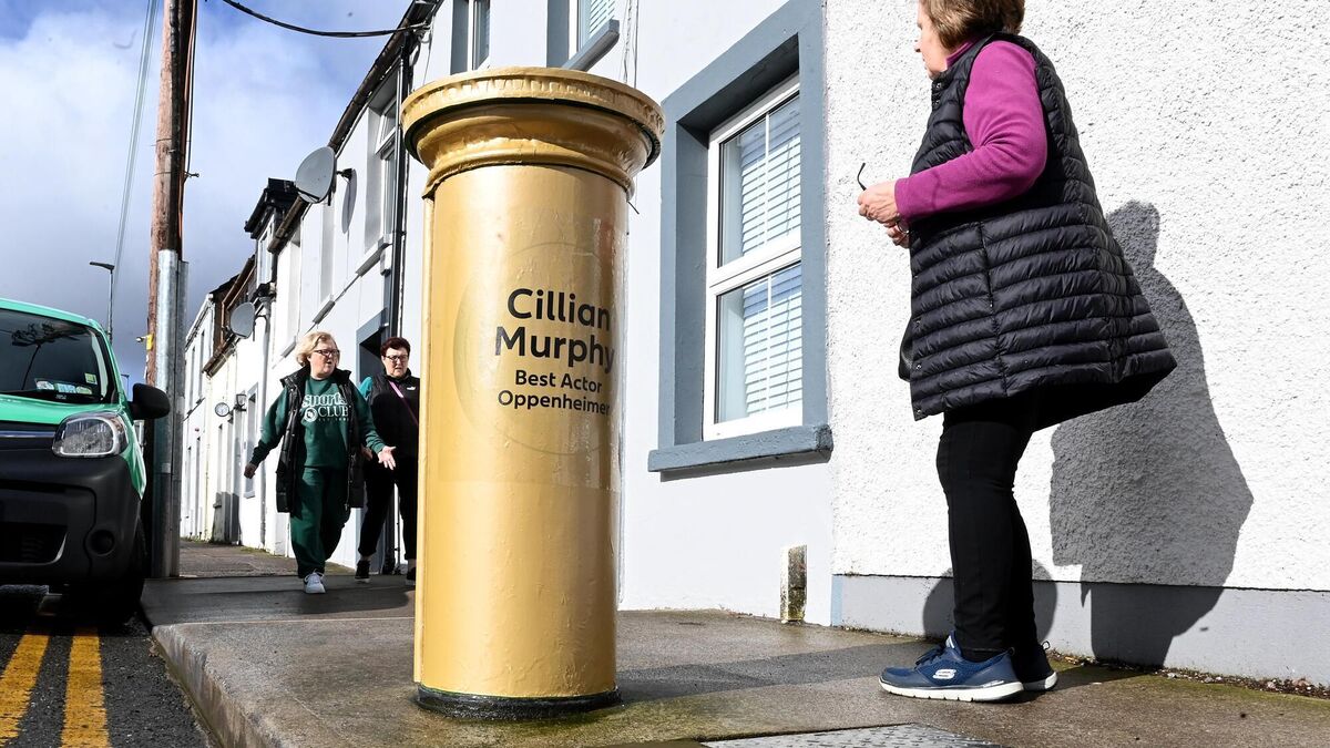 A gold wrap has been placed on the traditional green postbox in Ballintemple, near the childhood home of Cillian Murphy. Picture: Larry Cummins A gold wrap has been placed on the traditional green postbox in Ballintemple, near the childhood home of Cillian Murphy. Picture: Larry Cummins