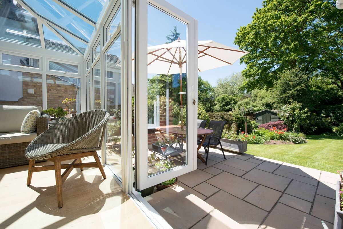 "Generally, if the space allows, your new patio doors would face the new patio which would point towards the West in your case." "Generally, if the space allows, your new patio doors would face the new patio which would point towards the West in your case."