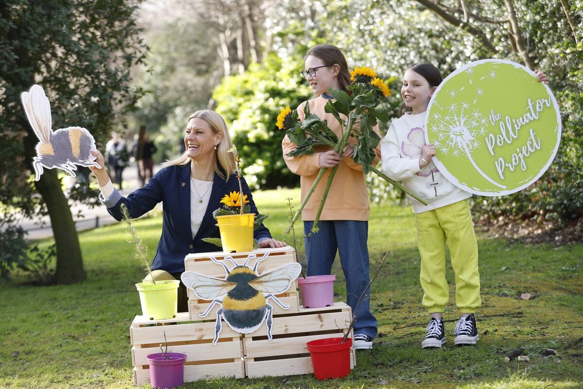 Jessica Egan (7), Minister for Biodiversity Pippa Hackett TD, Charlotte Egan (10) at the launch of the Pollinator Project, an initiative by social enterprise Biodiversity in Schools and supported by broadband operator SIRO, which provides teaching resources and expert workshops to schools to raise awareness of the importance of pollinators to Ireland's flora and fauna. Picture: Julien Behan Photography