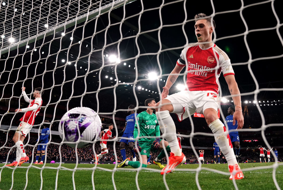 Arsenal's Leandro Trossard reacts after team-mate Ben White scored their side's fifth goal of the game during the Premier League match against Chelsea. Picture: Zac Goodwin/PA Wire. Arsenal's Leandro Trossard reacts after team-mate Ben White scored their side's fifth goal of the game during the Premier League match against Chelsea. Picture: Zac Goodwin/PA Wire.