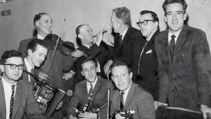 <p>Some of the members of Ceoltóirí Chualann: Michael Tubridy, Éamon de Buitléir, John Kelly, Anthony Kelly (John’s son), Sonny Brogan with whistle, Paddy Moloney, with Seán Ó Riada behind with Ronnie McShane and Seán Potts. Picture: Courtesy of Mercier Press</p>