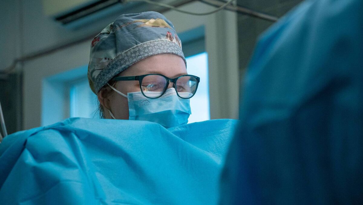 Ms Guénebaut-Cudmore endured the risks of the war in Ukraine to perform surgeries on children. Picture: Chernobyl Children International Ms Guénebaut-Cudmore endured the risks of the war in Ukraine to perform surgeries on children. Picture: Chernobyl Children International