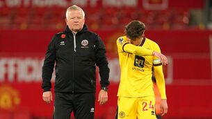 <p>Sheffield United manager Chris Wilder and Oliver Arblaster looking forlorn</p>