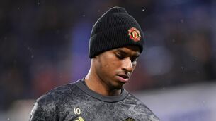 <p>Manchester United's Marcus Rashford warming up</p>