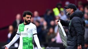 <p>WHEN POWER SLIPS AWAY: Mohamed Salah of Liverpool clashes with Jurgen Klopp. Pic: Justin SetterfieldGetty Images</p>