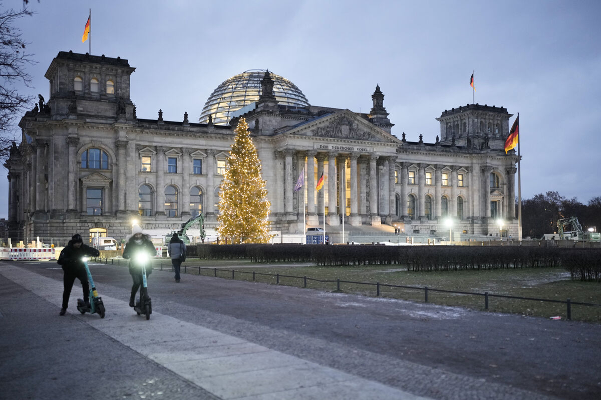 The Reichstag building with the German Parliament Bundestag is illuminated in Berlin, Germany. File Picture: AP Photo/Markus Schreiber