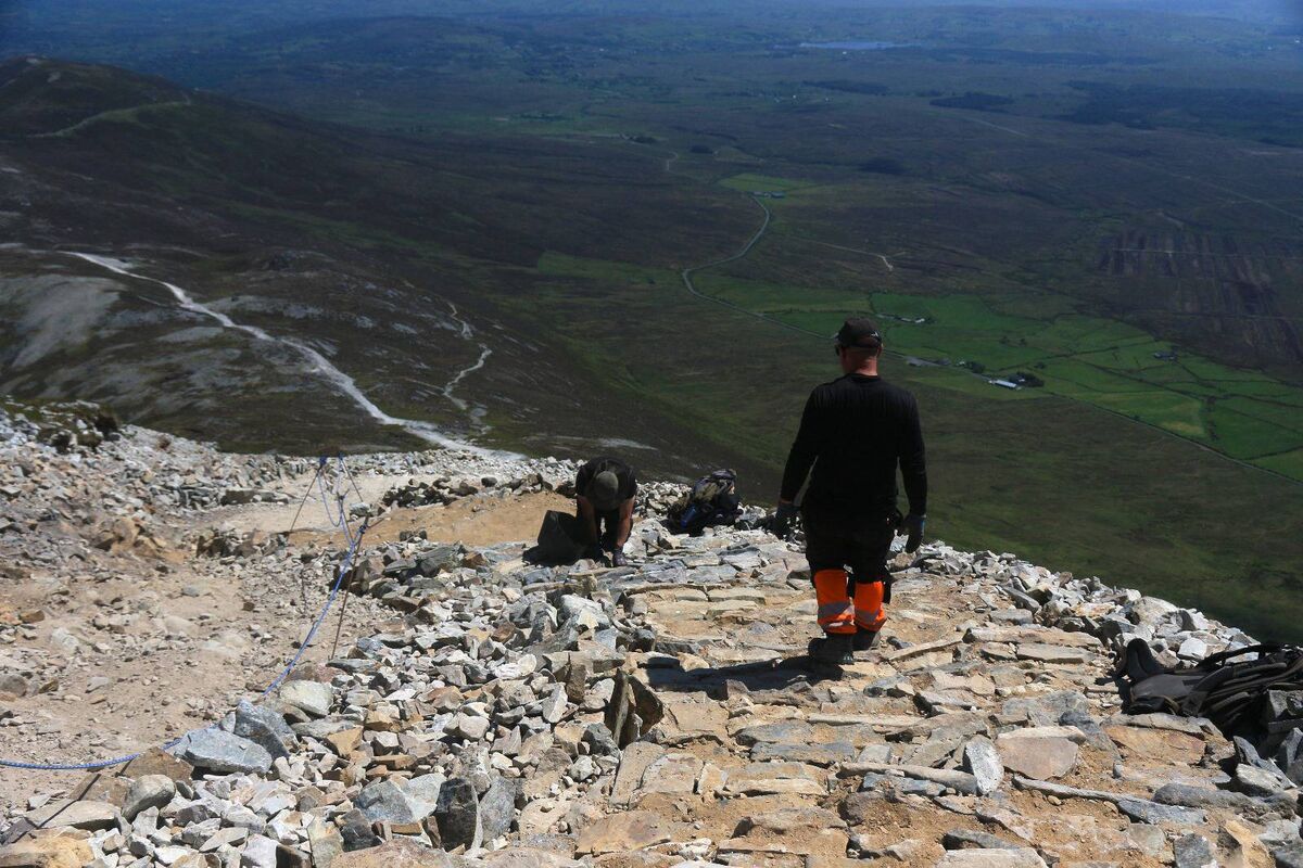 Frank McMahon was part of a team of five men who braced the elements to create a two-metre-wide pathway from the base of Croagh Patrick, all the way to top, in order to prevent further erosion. Picture: Frank McMahon