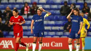 <p>Millie Bright and Niamh Charles of Chelsea react after Sophie Roman Haug of Liverpool (not pictured) scores her team's first goal during the Barclays WSL match. Photo by Naomi Baker/Getty Images</p>