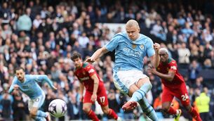 <p>Erling Haaland of Manchester City scores his team's third goal from the penalty spot. Photo by Matt McNulty/Getty Images</p>